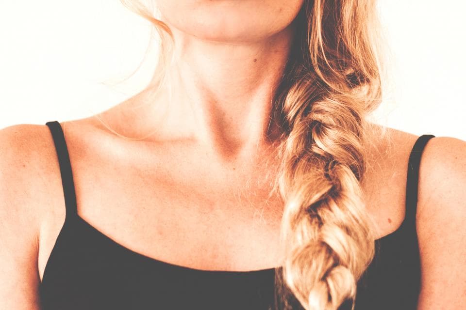 A loose fishtail braid over one shoulder