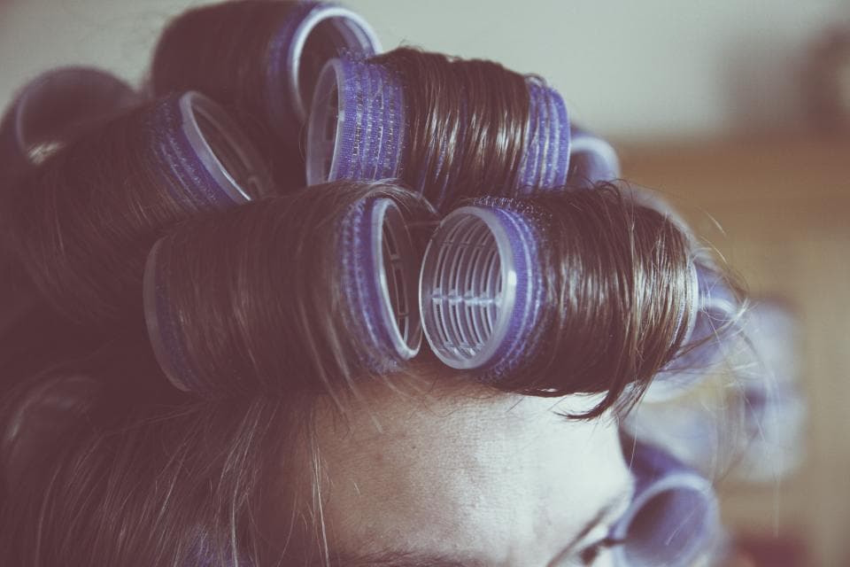 Hair set in rollers at the styling station